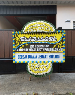 Papan Bunga Duka di Togeme